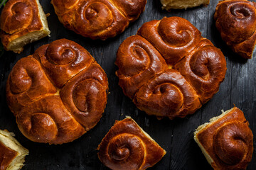 Fresh bread from the oven. Traditional cheese pie from Romania called Saralie. Homemade bread made from white wheat flour.