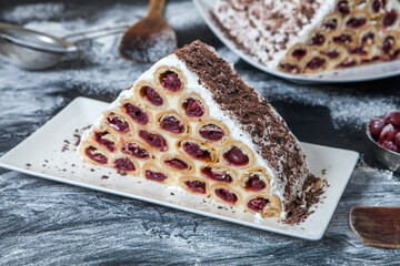 A traditional Moldavian dessert or cake consisting of pancakes with cherry, milk creme and chocolate creme also called Cosma lui Guguta.
