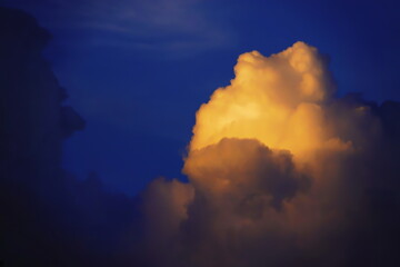 Blur focus Sunset sky yellow clouds on a blue sky  background  