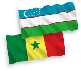 Flags of Republic of Senegal and Uzbekistan on a white background