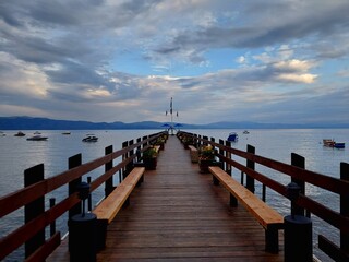 Pier on a lake at sunset