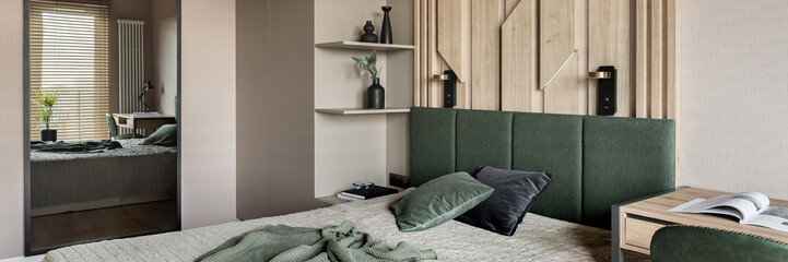 Cozy bedroom with mirror, panorama