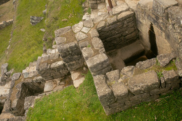 Details of the ancient Inca citadel of the city of Machu Picchu in the Sacred Valley of Peru.