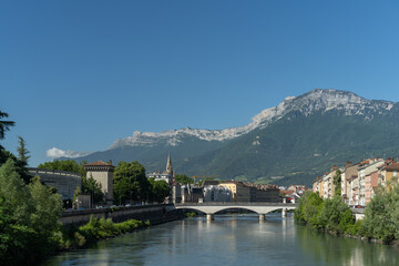 Obraz premium Grenoble, cityscape image of Grenoble and the Alps , France 