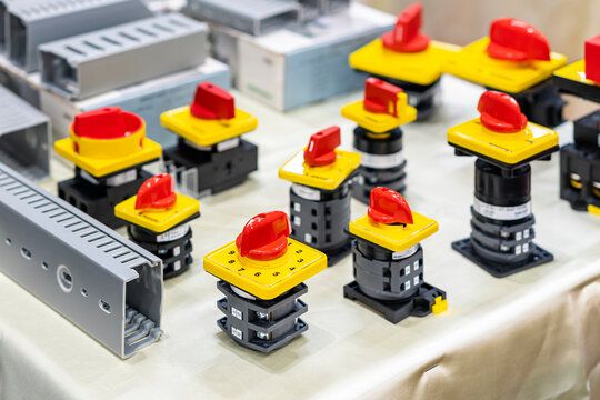 Close up various type of selector switch or rotary cam selector switch for electric power industrial and wire way slot trunking on table