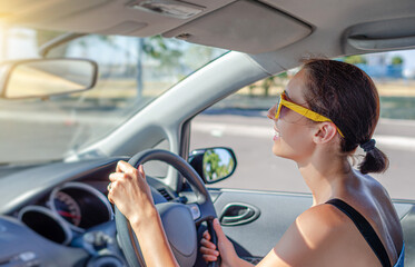 Young woman in a car