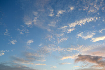 A background image of the morning sky and white clouds reflecting the natural beauty of the morning sun.