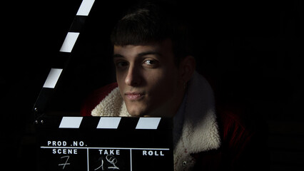 Actor ready for the ciak cinema scene during the production of short film in the night. Man inside...