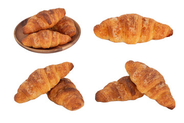 Croissant on wooden dish on isolated white background.