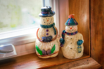 Two homemade Snowman figures sit on the windowsill in our home this Christmas Season. Mr & Mrs...