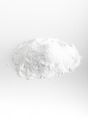Heap of coconut dried milk close up isolated