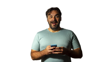 Young Latin man receiving good news over the phone	