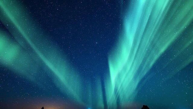 Aurora Green and Milky Way Galaxy Over Iceberg Tilt Down