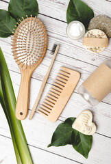 Personal care bamboo set of hairbrush, toothbrush, comb and shampoo bars. Sustainability and eco...