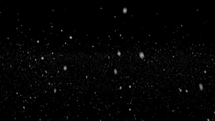 snowfall drops on black background. Falling real snowflakes shot on black background, matte, wide angle, animation with start and end, isolated, perfect for digital composition