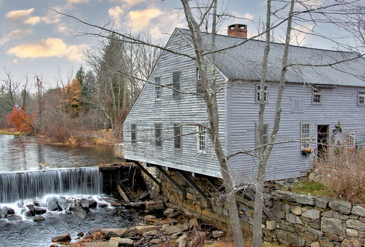 Rural New England scene. Squannacook River dam that once supplied power for this historic sawmill and cooperage in Townsend, Massachusetts.