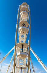 Grand Ferris Wheel Grande Roue at Esplanade du Pre des Pecheurs promenade in Vauban Port and yacht...