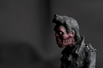 miniature figurine detail of a zombie