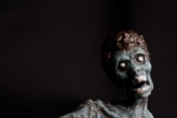 miniature figurine detail of a zombie