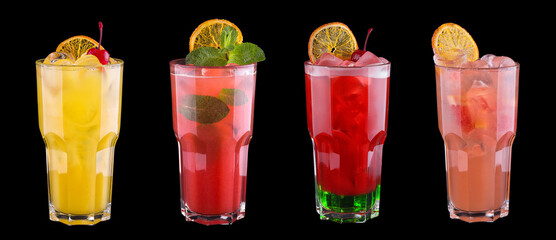 Alcoholic cocktails of different colors in highballs with mint, cherry and ice. Isolated on black