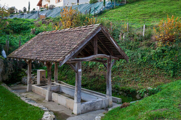 Fototapeta na wymiar Uriage les Bains, Isere, Rhone-Alpes, France, 20 11 2022 old wooden wash house