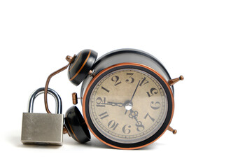 Alarm clock and lock white background.Concept of hope and value of time, time management, deadlines and urgency.