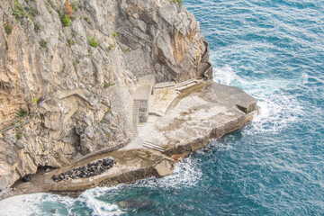 Naklejka premium Access to the sea, typical of Amalfi coast, Italy