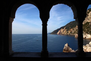 Loggia with arches overlooking the jagged Ligurian coast, dating back to the Benedictine abbey of...