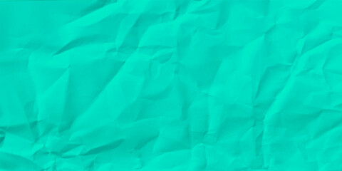 Creased blue cloth material fragment as a background. Crumpled sheet of light blue paper abstract background.