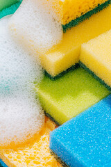cleaning sponge background. sponges for cleaning different colors and different sizes