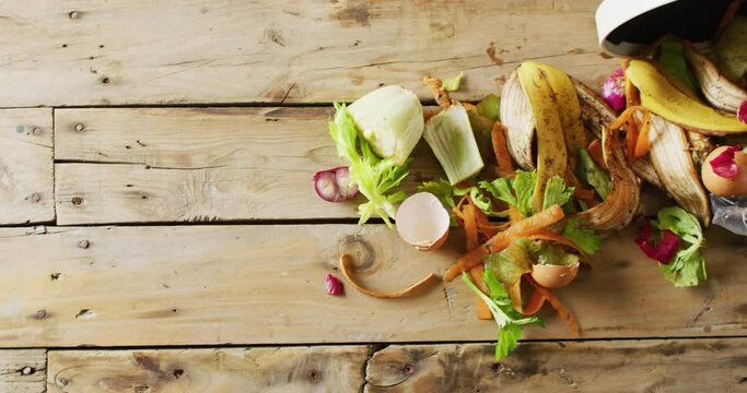 Video of organic, fruit and vegetable waste spilling from kitchen composting bin