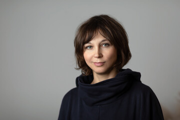 Fototapeta premium Portrait of woman over 40 years old. Close-up, look into camera