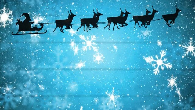Animation of santa claus in sleigh with reindeer and christmas snow falling