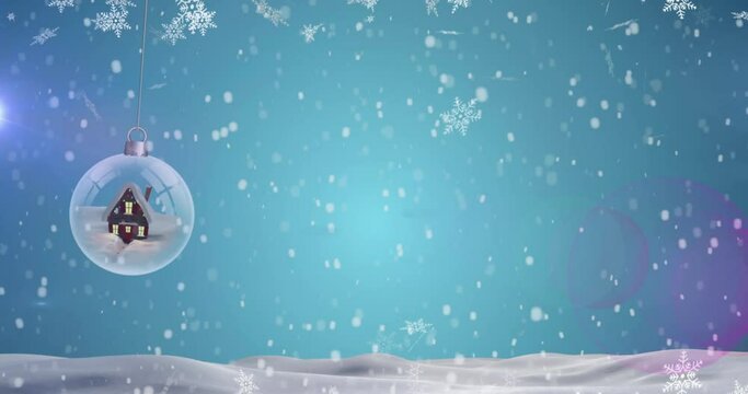 Animation of snow falling over shooting star and christmas snow globe bauble