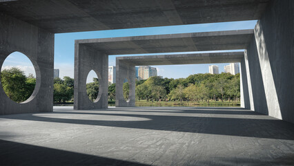 Space for products showcases in a concrete hallway with the park background.