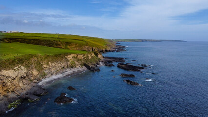 The southern coast of Ireland, top view. Blue sea space. Seascape. Aerial photo. Drone point of view.