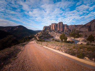 Aerial photography taken from a drone in the Vadiello reservoir in the province of Huesca, Aragon, in which you can see the Vadiello mallos in the Sierra de Guara. Spain