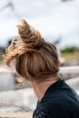 woman with long hair from behind