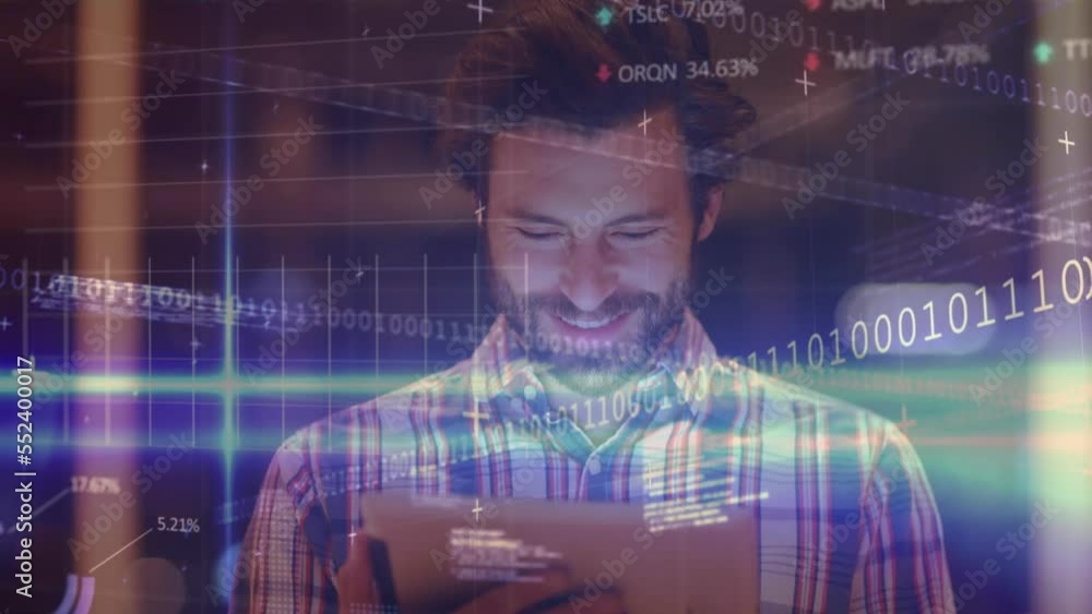 Aufkleber animation of financial graphs and data over caucasian man working on tablet in office