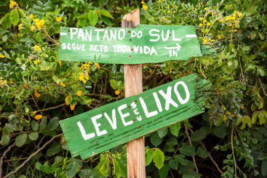 Hiking signs on beach trail, Florian&oacute;polis, Brazil