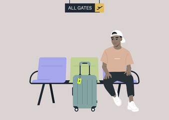 A passenger waiting for departure in the airport lounge with their cabin luggage, all gates sign hanging from the ceiling