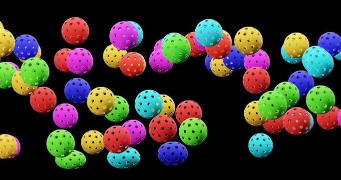 Many colorful balls with holes for pickleball on a transparent background. 3d vj loop