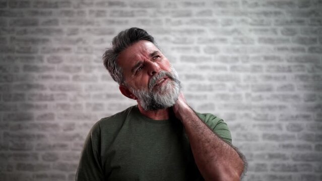 Man feels neck pain after woke up in morning, uncomfortable matrass, closeup