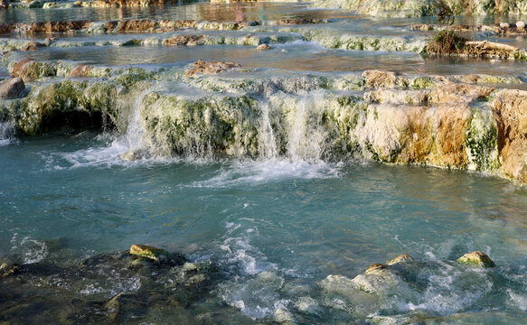 The beautiful Cascate del Mulino, natural limestone pools and free spas of Saturnia, Grosseto, Tuscany, Italy. Sulphuric waters rising from the ground at 37.5°C creating warm thermal pools for bathing © Travelphotos