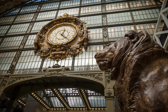 Clock and lion statue in Orsay museum, Paris, France