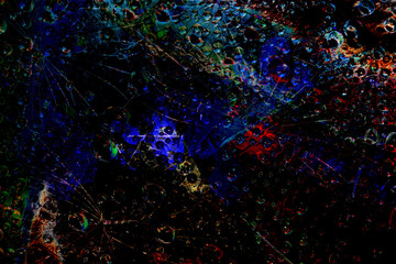 Space abstraction. Multicolored spheres are illuminated by flashes of red-cyan light and are located against a black background. 3D render.