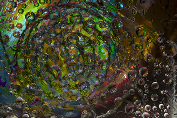 Space abstraction. Striped spheres are located against the green-yellow background with web silhouette. 3D render. 
