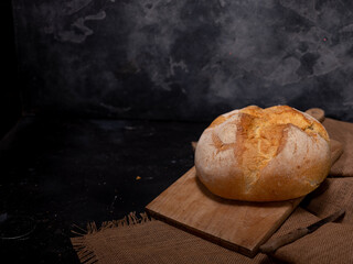 bread with seeds on a beach concrete background