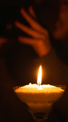 Blackout in Ukraine 2022. Life during war in Ukraine. Candles and love. Burning candle in the dark