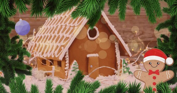 Animation of spots of light over christmas winter scenery with gingerbread house